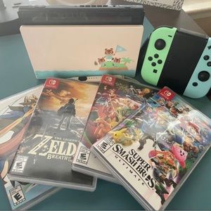Nintendo Switch Console whole package) plus 4 games, headphones, cords etc.